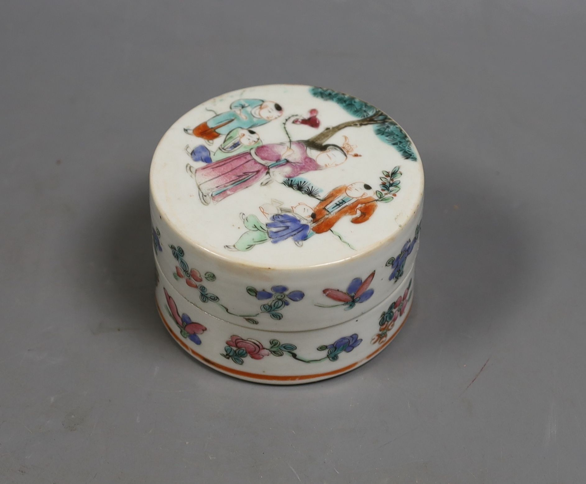 A 19th century Chinese famille rose box and cover, Liberty retail label, 9.5 cms diameter.